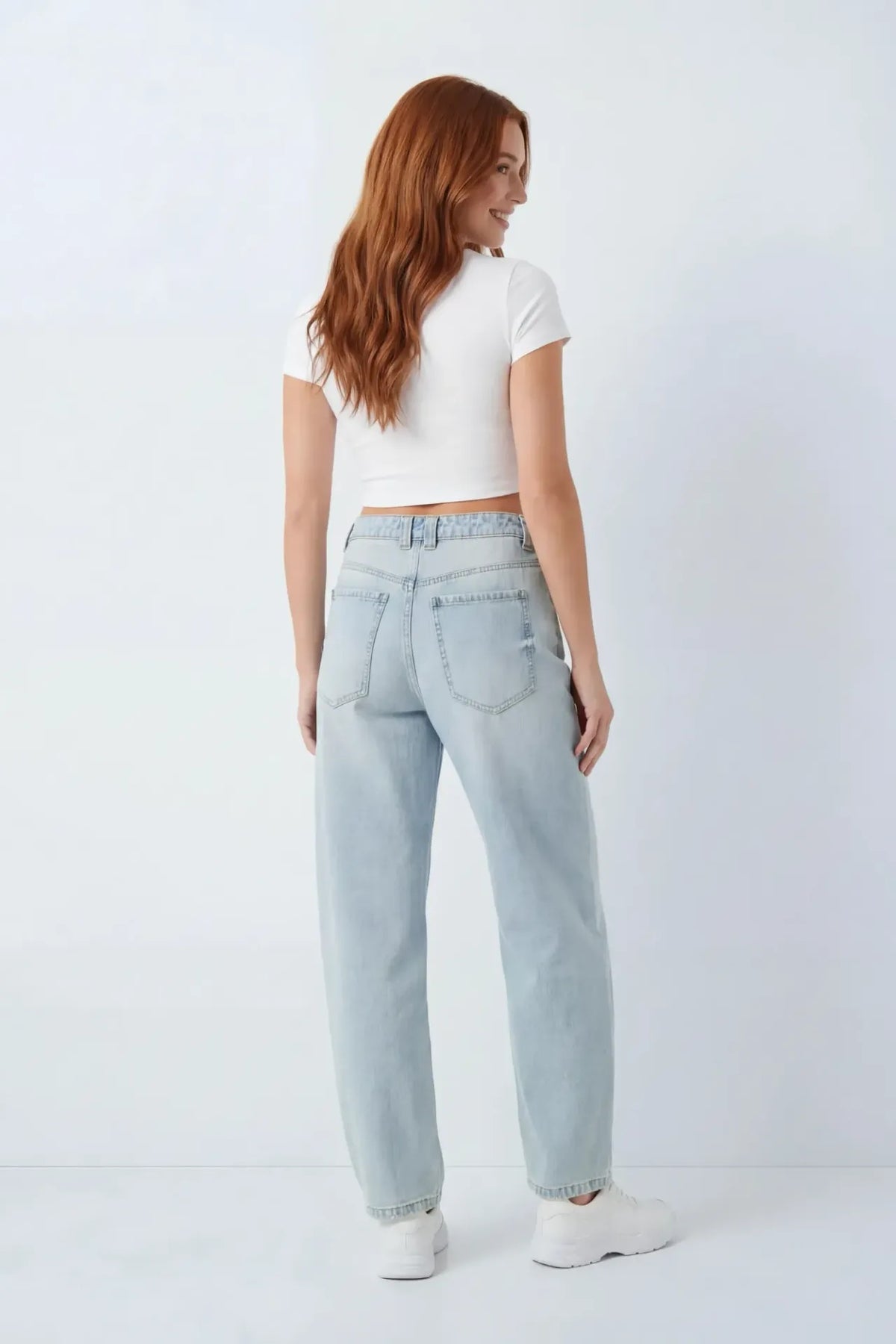 Alt View 2. Low Rise Barrel Jean - Light Denim Blue