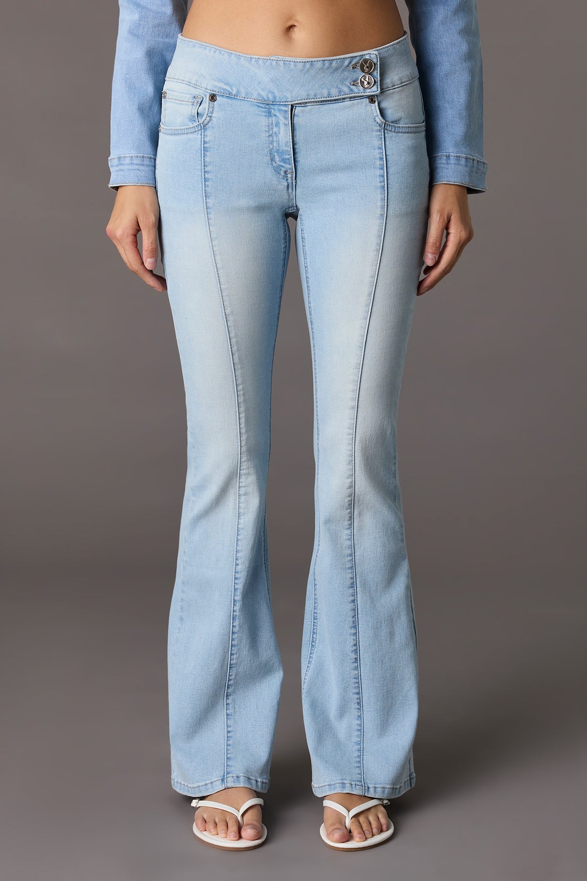 Alt View 2. Playboy Low Rise Flare Jean - Light Denim Blue