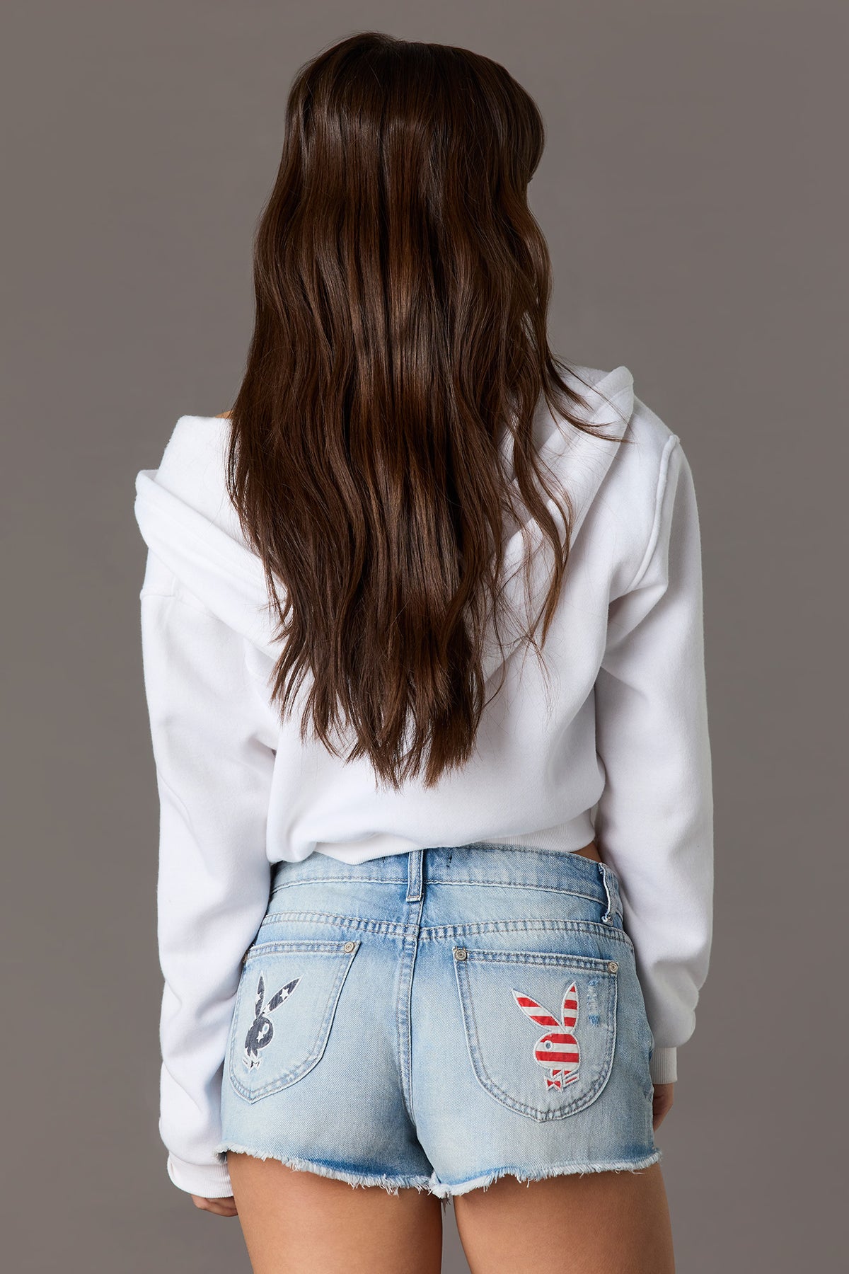 Alt View 2. Playboy Patch Low-Rise Ripped Denim Short - Light Denim Blue