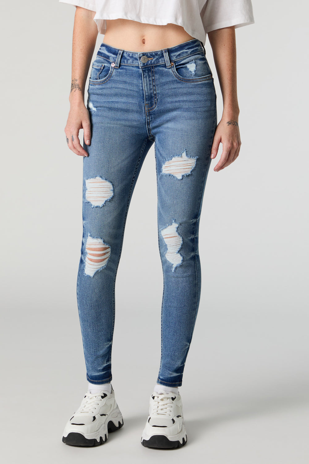 Rio Medium Wash Mid Rise Distressed Skinny Jean Rio Medium Wash Mid Rise Distressed Skinny Jean 2