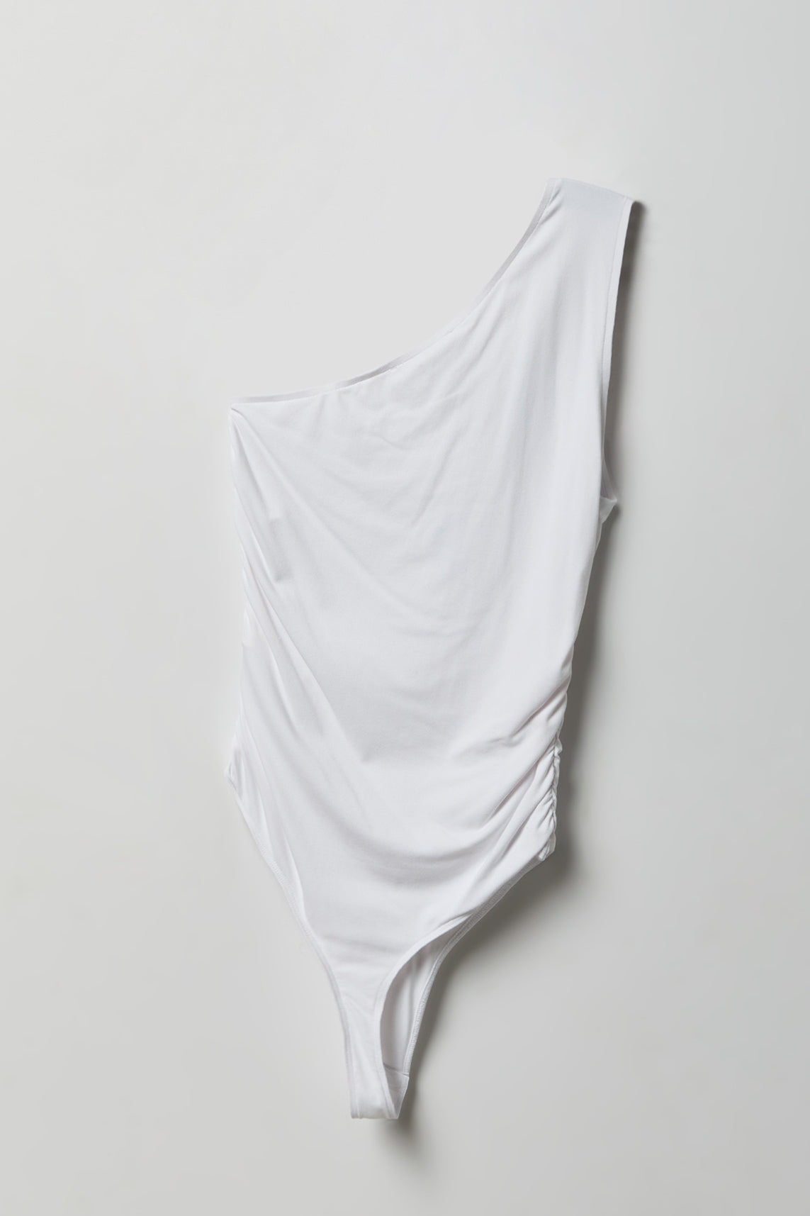 Alt View 2. Luxe Heavy Contour One Shoulder Bodysuit - White